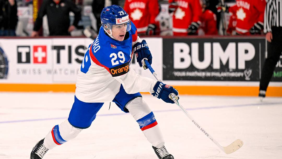 Jan 2, 2026; Minneapolis, Minnesota, USA;  Slovakia forward Tomas Chrenko (29) shoots the puck against Canada during the third period in the quarterfinals of the 2026 IIHF World Junior Championship at 3M Arena. Mandatory Credit: Nick Wosika-Imagn Images