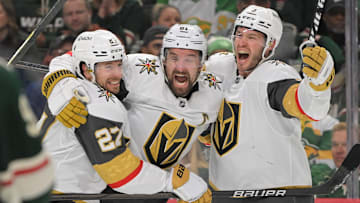 May 1, 2025; Saint Paul, Minnesota, USA;  Vegas Golden Knights forward Mark Stone (61) celebrates his goal against the Minnesota Wild with defenseman Brayden McNabb (3) and defenseman Shea Theodore (27) during the third period in game six of the first round of the 2025 Stanley Cup Playoffs at Xcel Energy Center. Mandatory Credit: Nick Wosika-Imagn Images