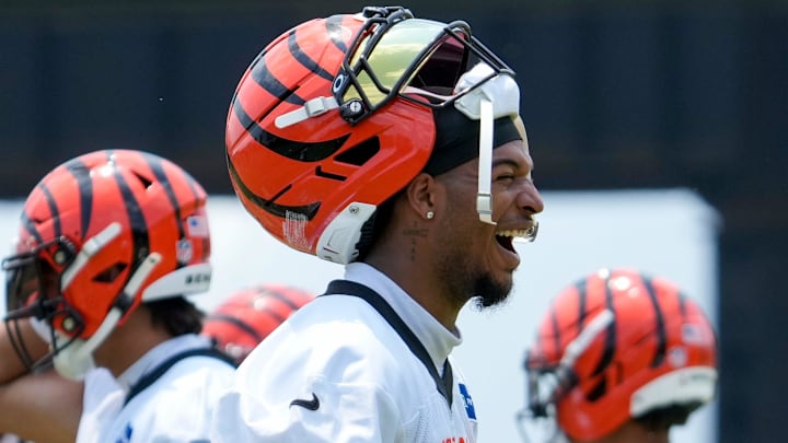 Cincinnati Bengals wide receiver Ja'Marr Chase (1) laughs between plays during a session of organized team activities on the Bengals practice field at Paycor Stadium in downtown Cincinnati on Tuesday, June 3, 2025.