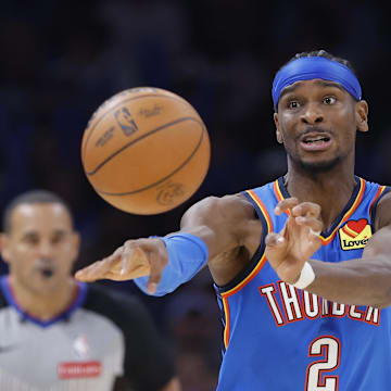 Oct 30, 2025; Oklahoma City, Oklahoma, USA; Oklahoma City Thunder guard Shai Gilgeous-Alexander (2) passes against the Washington Wizards during the second half at Paycom Center. Mandatory Credit: Alonzo Adams-Imagn Images