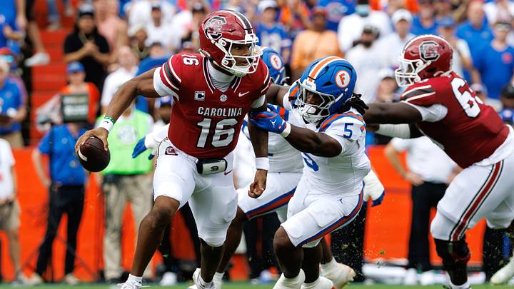 Oct 10, 2026; Gainesville, Florida, USA;  Florida Gators inside linebacker Myles Graham (5) chases South Carolina Gamecocks quarterback LaNorris Sellers (16) during the first half at Ben Hill Griffin Stadium.  Mandatory Credit: Matt Pendleton-Imagn Images