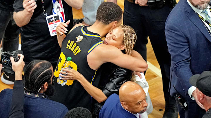 Golden State Warriors guard Stephen Curry (30) celebrates with his mother Sonya Curry after beating the Boston Celtics during game four of the 2022 NBA Finals at TD Garden.