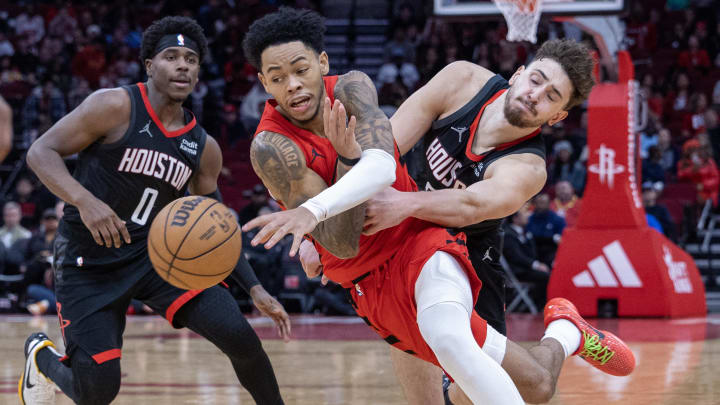 Jan 24, 2024; Houston, Texas, USA; Portland Trail Blazers guard Anfernee Simons (1) dribbles against Houston Rockets center Alperen Sengun (28) in the fourth quarter at Toyota Center. Mandatory Credit: Thomas Shea-USA TODAY Sports