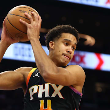 Apr 9, 2025; Phoenix, Arizona, USA; Phoenix Suns center Oso Ighodaro (4) against the Oklahoma City Thunder at Footprint Center. Mandatory Credit: Mark J. Rebilas-Imagn Images
