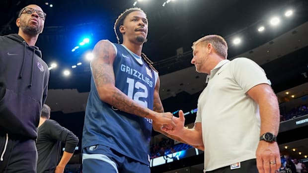 Grizzlies' Ja Morant (12) walks off the court after open practice 