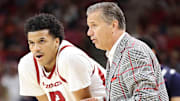 Arkansas Razorbacks forward Malique Ewin talks to coach John Calipari during the second half against the Jackson State Tigers at Bud Walton Arena. Arkansas won 115-61.