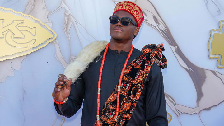 Jun 13, 2024; Kansas City, MO, USA; Kansas City Chiefs Chukwuebuka Godrick poses for a photo on the red carpet at the Nelson-Akins Museum of Art. Mandatory Credit: Denny Medley-USA TODAY Sports