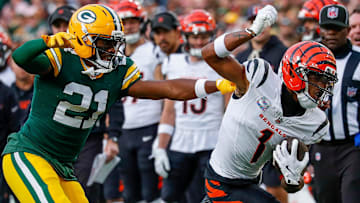 Green Bay Packers cornerback Nate Hobbs (21) forces Cincinnati Bengals wide receiver Ja'Marr Chase (1) out of bounds on Sunday, October 12, 2025, at Lambeau Field in Green Bay, Wis.