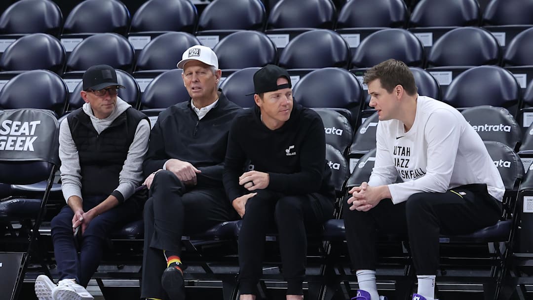 Feb 6, 2024; Salt Lake City, Utah, USA; From left to right, Utah Jazz general manager Justin Zanik, CEO Danny Ainge, owner Ryan Smith and head coach Will Hardy sit court side before the game between the Utah Jazz and the Oklahoma City Thunder at Delta Center. Mandatory Credit: Rob Gray-Imagn Images