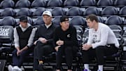Feb 6, 2024; Salt Lake City, Utah, USA; From left to right, Utah Jazz general manager Justin Zanik, CEO Danny Ainge, owner Ryan Smith and head coach Will Hardy sit court side before the game between the Utah Jazz and the Oklahoma City Thunder at Delta Center. Mandatory Credit: Rob Gray-Imagn Images