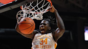 Nov 17, 2025; Knoxville, Tennessee, USA;  Tennessee Volunteers center Felix Okpara (34) dunks the ball against the Rice Owls during the first half at Thompson-Boling Arena at Food City Center. Mandatory Credit: Randy Sartin-Imagn Images
