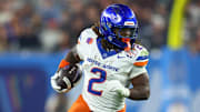 Boise State Broncos running back Ashton Jeanty (2) rushes the ball against the Penn State Nittany Lions during the first half in the Fiesta Bowl at State Farm Stadium. 