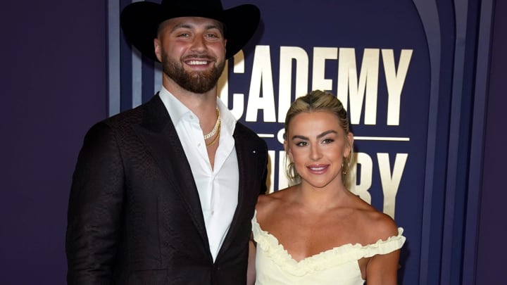 Jake Ferguson and Haley Cavinder the carpet at the 59th ACM Awards at the Ford Center at the Star in Frisco, Texas, Thursday, May 16, 2024.