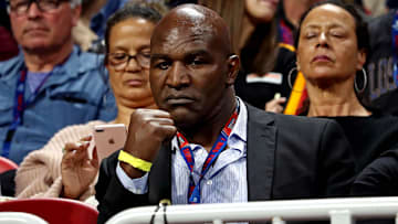 Former boxer Evander Holyfield poses during the Super Bowl LIII between the New England Patriots and the Los Angeles Rams