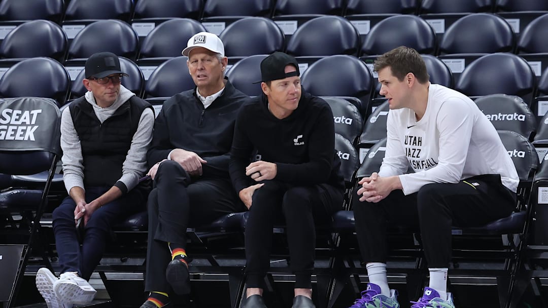 Feb 6, 2024; Salt Lake City, Utah, USA; From left to right, Utah Jazz general manager Justin Zanik, CEO Danny Ainge, owner Ryan Smith and head coach Will Hardy sit court side before the game between the Utah Jazz and the Oklahoma City Thunder at Delta Center. Mandatory Credit: Rob Gray-Imagn Images