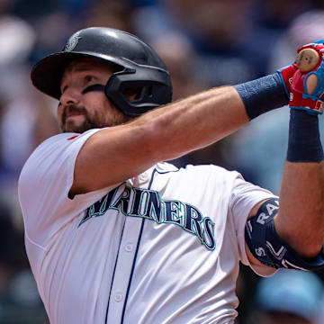 Seattle Mariners designated hitter Cal Raleigh hits a two-run home run.
