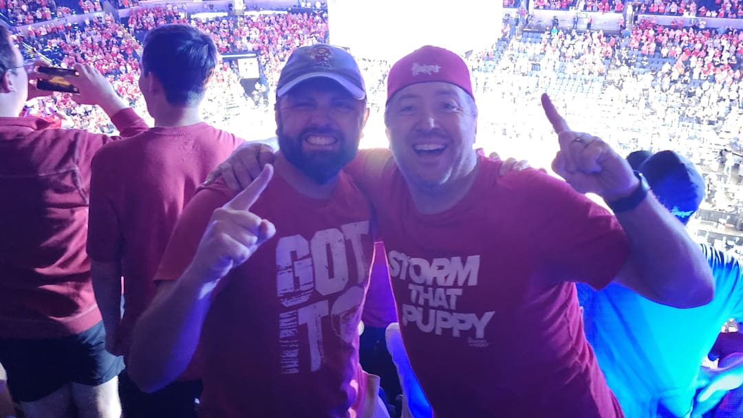 Cole and Jeff hold still just long enough to have their picture taken shortly after Nebraska's thrilling second-round victory over Vanderbilt, 72-70, at Paycom Center in Oklahoma City, on Saturday, March 21, 2026.