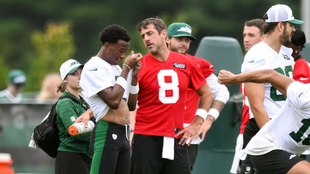 New York Jets wide receiver Garrett Wilson and quarterback Aaron rodgers