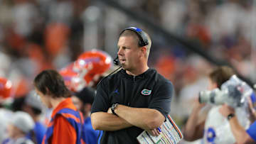 Sep 20, 2025; Miami Gardens, Florida, USA; Florida Gators head coach Billy Napier watches from the sideline against the Miami Hurricanes during the second quarter at Hard Rock Stadium. Mandatory Credit: Sam Navarro-Imagn Images