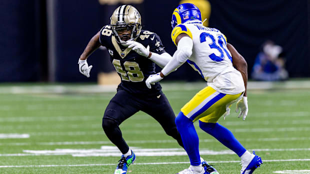  New Orleans Saints safety J.T. Gray (48) and New Orleans Saints safety Roderic Teamer (30) run downfield on a punt return.
