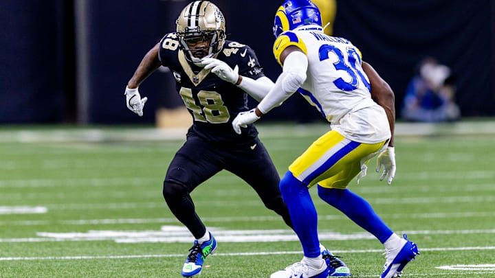 Dec 1, 2024; New Orleans, Louisiana, USA; New Orleans Saints safety J.T. Gray (48) and New Orleans Saints safety Roderic Teamer (30) run downfildagainst the hduring the second half at Caesars Superdome. Mandatory Credit: Stephen Lew-Imagn Images Dec 1, 2024; New Orleans, Louisiana, USA; New Orleans Saints safety J.T. Gray (48) and New Orleans Saints safety Roderic Teamer (30) run downfildagainst the hduring the second half at Caesars Superdome. Mandatory Credit: Stephen Lew-Imagn Images