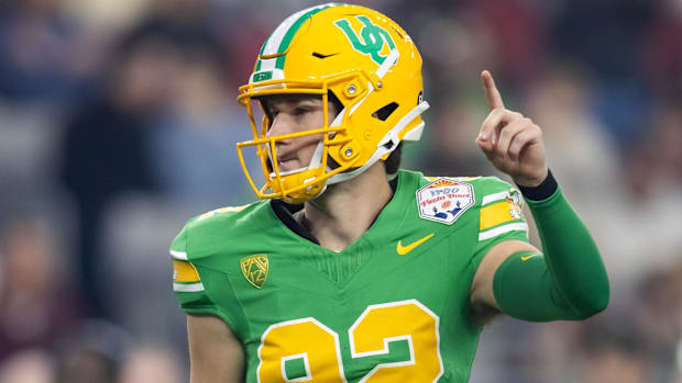 dan lanning oregon ducks northwestern wildcats oklahoma state cowboys dante moore quarterback running backs wide receiver