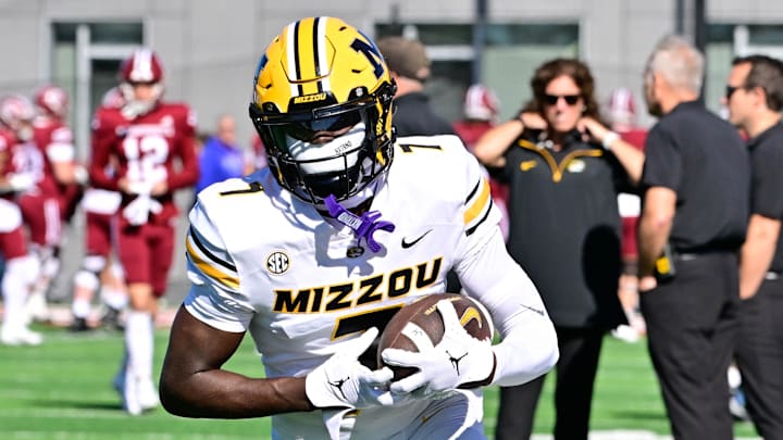 Oct 12, 2024; Amherst, Massachusetts, USA; Missouri Tigers wide receiver Courtney Crutchfield (7) warms up before a game against the Massachusetts Minutemen at Warren McGuirk Alumni Stadium. Mandatory Credit: Eric Canha-Imagn Images