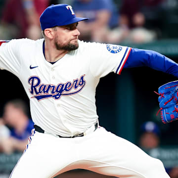 May 27, 2025; Arlington, Texas, USA; Texas Rangers starting pitcher Nathan Eovaldi (17) throws during the first inning against the Toronto Blue Jays at Globe Life Field. Mandatory Credit: Kevin Jairaj-Imagn Images