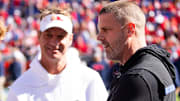 Florida Gators head coach Billy Napier talks with Mississippi Rebels head coach Lane Kiffin before the start of the game at Ben Hill Griffin Stadium in Gainesville, FL on Saturday, November 23, 2024. [Doug Engle/Gainesville Sun]