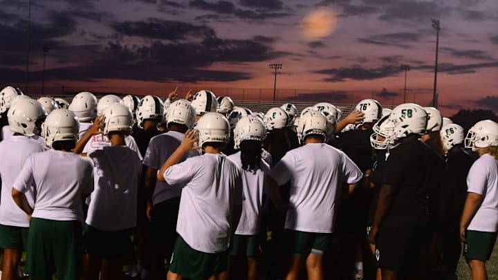 Melbourne High's football team opened the first day of practice at 6 a.m. for the second straight year, opting to beat the heat as players prepare for the 2025 season.