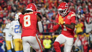 Dec 8, 2024; Kansas City, Missouri, USA; Kansas City Chiefs wide receiver DeAndre Hopkins (8) celebrates with wide receiver Xavier Worthy (1) after scoring against the Los Angeles Chargers during the first half at GEHA Field at Arrowhead Stadium. Mandatory Credit: Denny Medley-Imagn Images