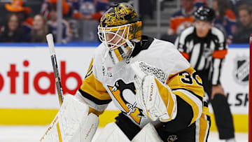 Oct 25, 2024; Edmonton, Alberta, CAN; Pittsburgh Penguins goaltender Joel Blomqvist (30) follows the play against the Edmonton Oilers at Rogers Place. Mandatory Credit: Perry Nelson-Imagn Images