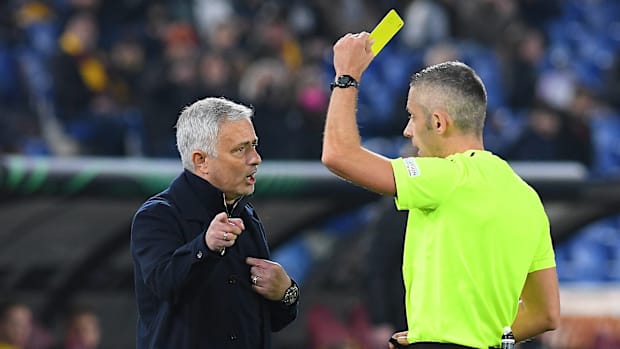 Jose Mourinho gets a yellow card. 