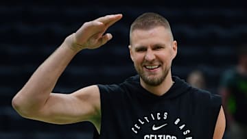 Kristaps Porzingis #8 of the Boston Celtics reacts during warm-ups before facing the New York Knicks in the 2025 NBA Playoffs.