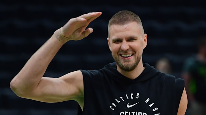Kristaps Porzingis #8 of the Boston Celtics reacts during warm-ups before facing the New York Knicks in the 2025 NBA Playoffs.