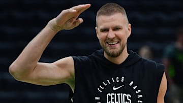 May 14, 2025; Boston, Massachusetts, USA; Boston Celtics center Kristaps Porzingis (8) reacts prior to game five of the second round for the 2025 NBA Playoffs against the New York Knicks at TD Garden. Mandatory Credit: Bob DeChiara-Imagn Images