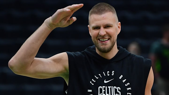 May 14, 2025; Boston, Massachusetts, USA; Boston Celtics center Kristaps Porzingis (8) reacts prior to game five of the second round for the 2025 NBA Playoffs against the New York Knicks at TD Garden. Mandatory Credit: Bob DeChiara-Imagn Images