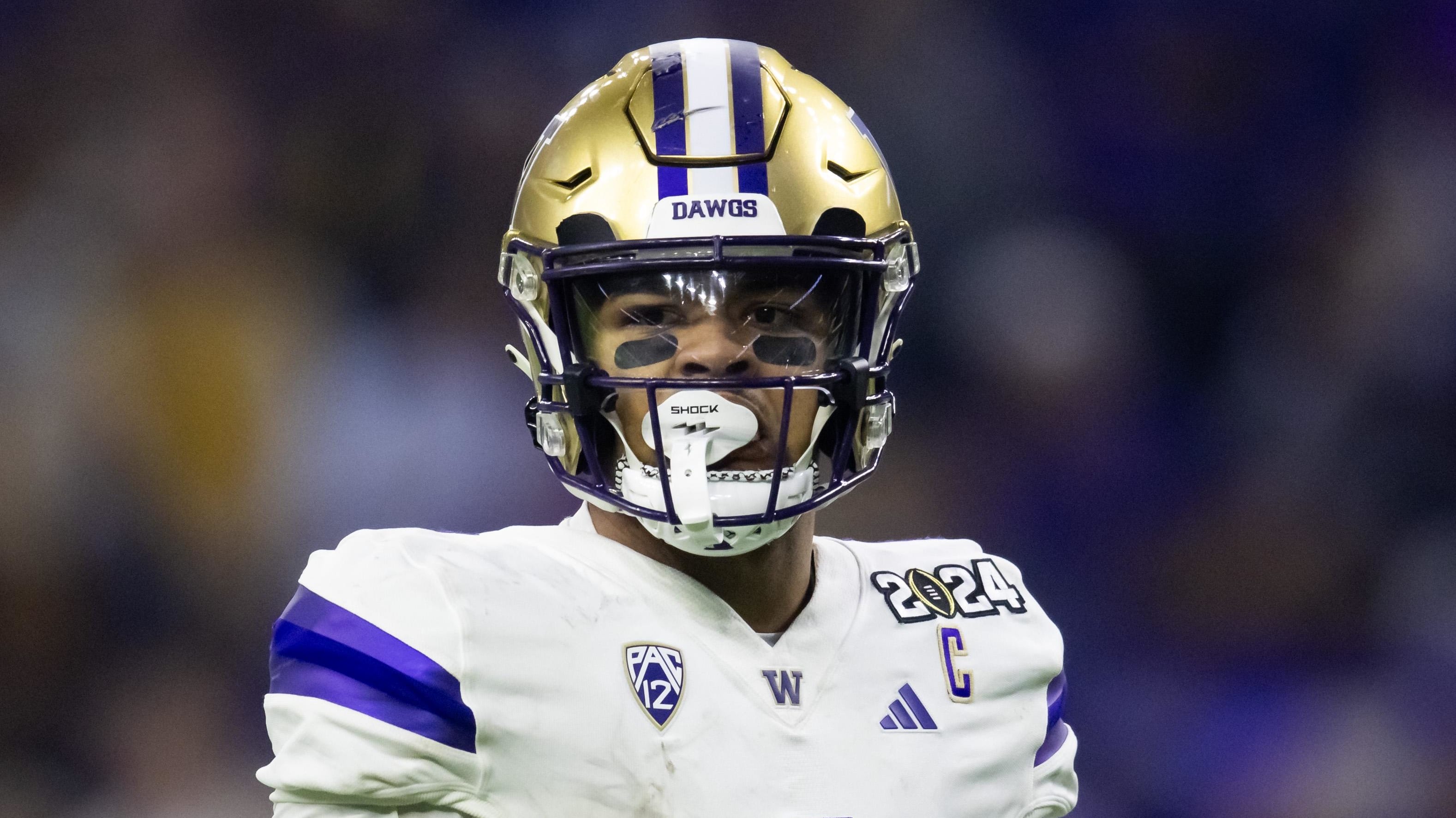 Jan 8, 2024; Houston, TX, USA; Washington Huskies wide receiver Rome Odunze (1) against the Michigan