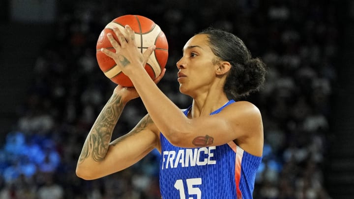 Aug 7, 2024; Paris, France; France forward Gabby Williams (15) shoots the ball against Germany in the women’s basketball quarterfinals during the Paris 2024 Olympic Summer Games at Accor Arena. 