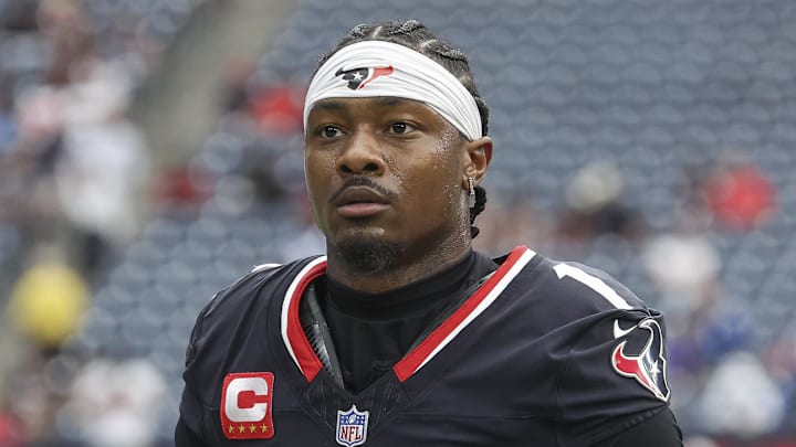Houston Texans receiver Stefon Diggs walks to the sidelines. Houston Texans receiver Stefon Diggs walks to the sidelines.