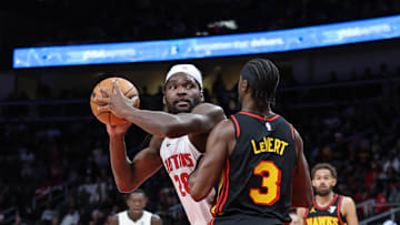 Feb 23, 2025; Atlanta, Georgia, USA; Atlanta Hawks guard Caris LeVert (3) plays defense against Detroit Pistons center Isaiah Stewart (28) during the first quarter at State Farm Arena. Mandatory Credit: Jordan Godfree-Imagn Images