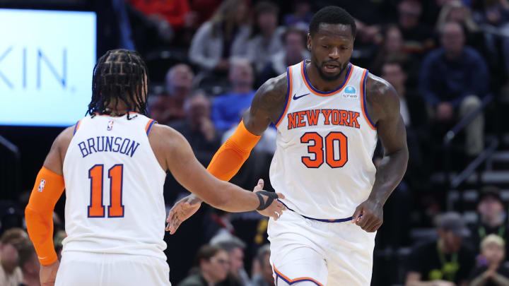 Dec 13, 2023; Salt Lake City, Utah, USA; New York Knicks forward Julius Randle (30) and guard Jalen Brunson (11) react to a play against the Utah Jazz during the third quarter at Delta Center. Mandatory Credit: Rob Gray-USA TODAY Sports