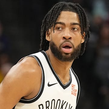 Nov 24, 2024; Sacramento, California, USA; Brooklyn Nets forward Trendon Watford (9) dribbles against the Sacramento Kings during the second quarter at Golden 1 Center. Mandatory Credit: Darren Yamashita-Imagn Images