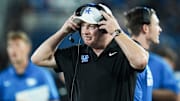 Kentucky Wildcats head football coach Mark Stoops on the sidelines during the game against Eastern Michigan at Kroger Field in Lexington, Kentucky Saturday, Sept. 13, 2025.