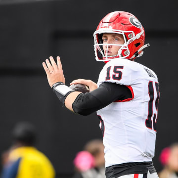 Oct 14, 2023; Nashville, Tennessee, USA;  Georgia Bulldogs quarterback Carson Beck (15) throws a pass against the Vanderbilt Commodores during the second half at FirstBank Stadium. Mandatory Credit: Steve Roberts-USA TODAY Sports