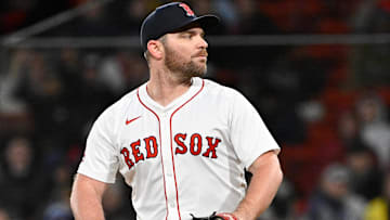 Boston Red Sox relief pitcher Liam Hendriks (31) pitches against the New York Mets during the sixth inning at Fenway Park.