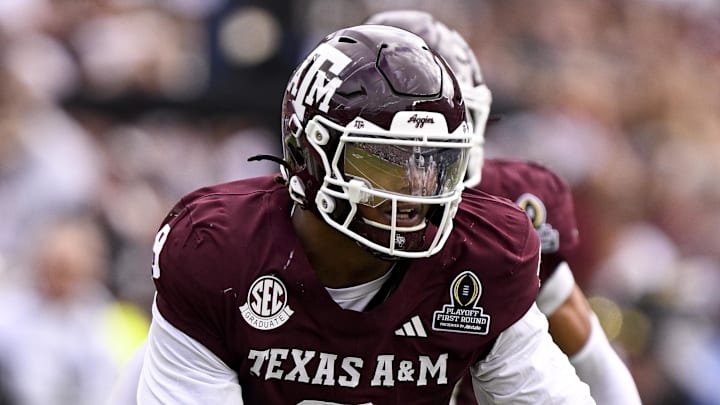 Dec 20, 2025; College Station, TX, USA; Texas A&M Aggies defensive end Cashius Howell (9) rushes the line during the game between the Aggies and the Hurricanes at Kyle Field. Mandatory Credit: Jerome Miron-Imagn Images