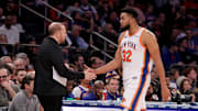 Jan 10, 2025; New York, New York, USA; New York Knicks center Karl-Anthony Towns (32) shakes hands with New York Knicks head coach Tom Thibodeau as he exits the game during the third quarter against the Oklahoma City Thunder at Madison Square Garden. Mandatory Credit: Brad Penner-Imagn Images