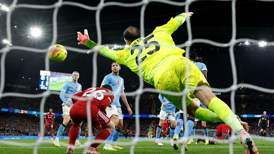 Andy Robertson (left) and Gianluigi Donnarumma.