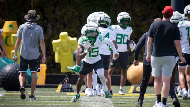 Oregon wide receiver Tez Johnson works out during the Ducks’ fall camp Wednesday